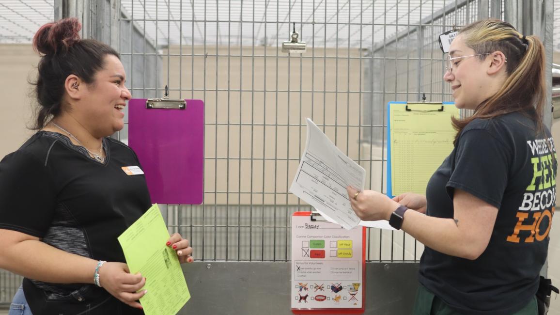 Jakie Hernandez with another person doing population rounds at a shelter